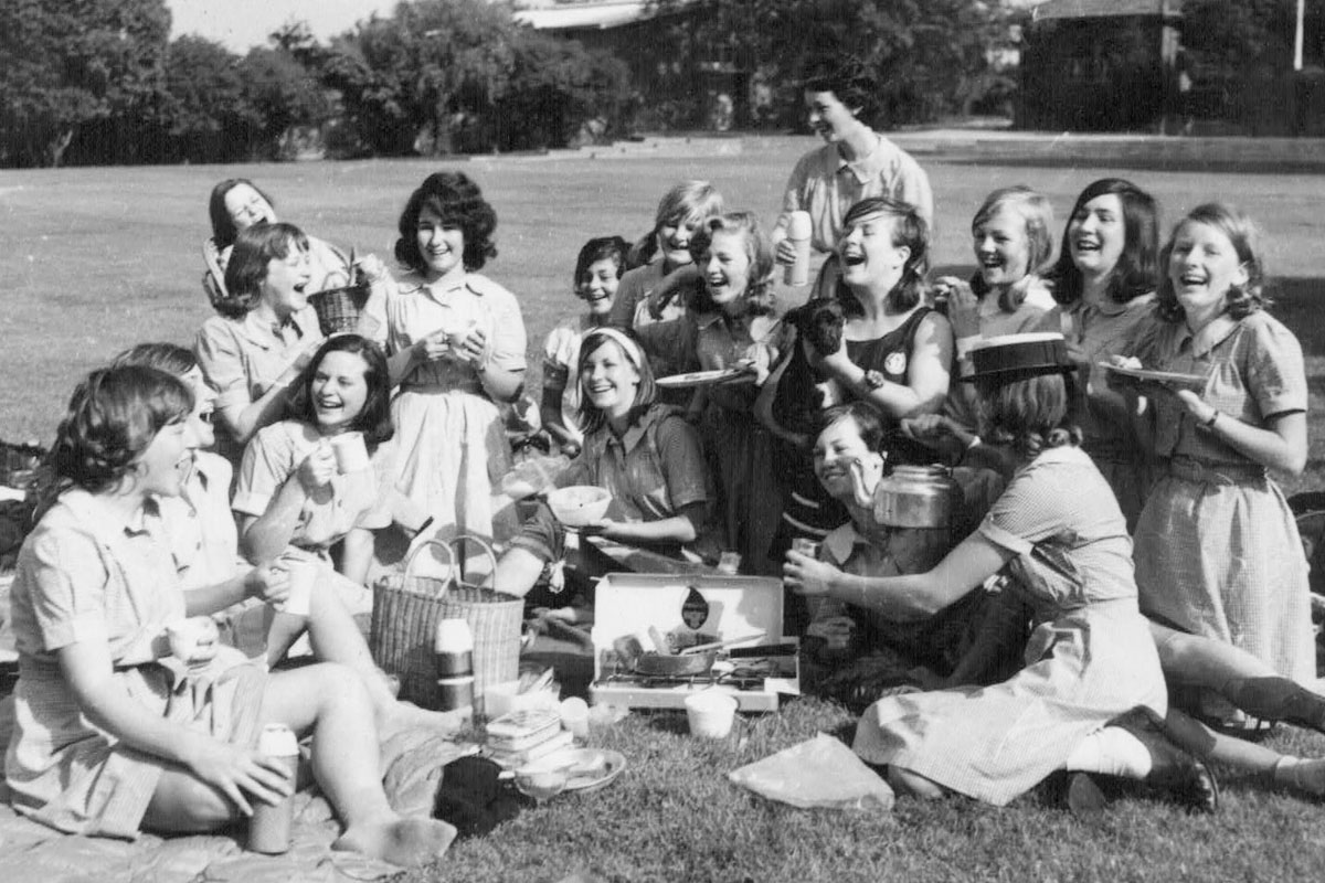 Matriculation students picnic on the oval on the final day of school, 1963
