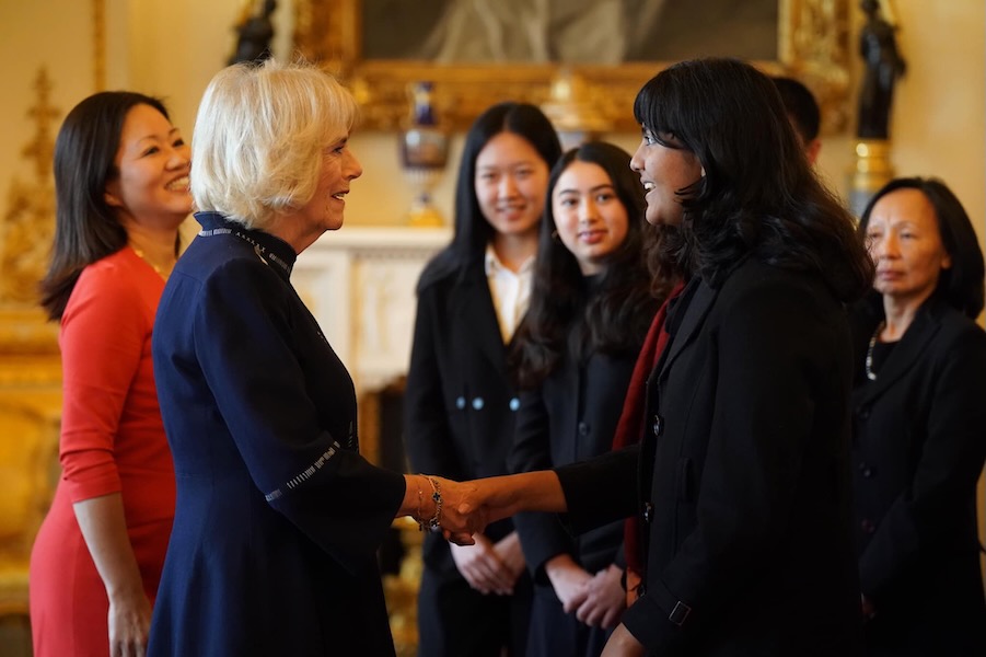 The Queen Consort with Maulika Pandey during a reception for winners of the Queen's Commonwealth Essay Competition, at Buckingham Palace in London. Picture date: Thursday November 17, 2022.