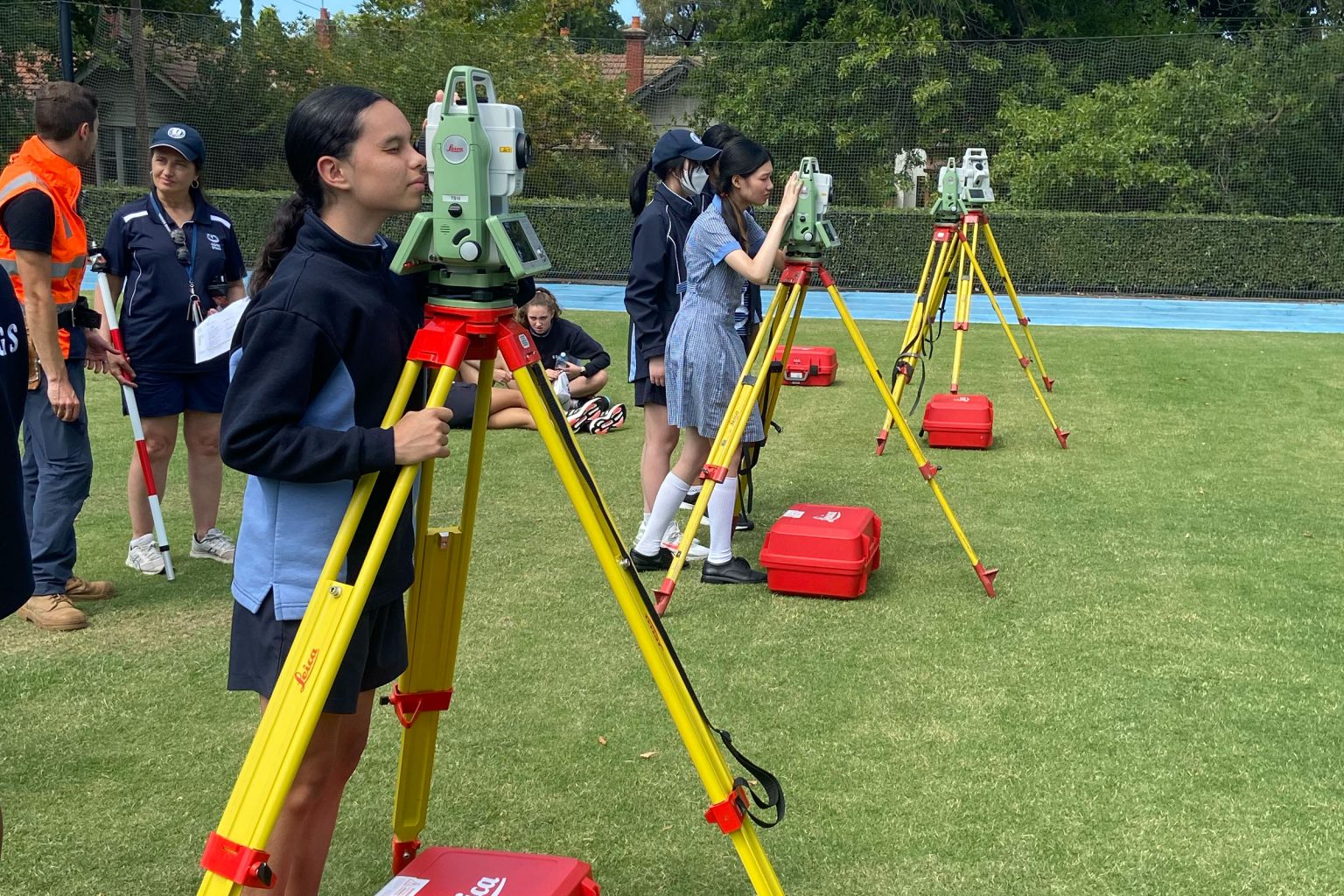 Melbourne University Geomatics Society facilitate workshops introducing students to surveying technology.