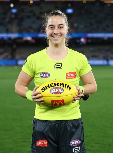 MELBOURNE, AUSTRALIA - AUGUST 23: Kaitlin Barr making her umpiring debut during the 2025 AFL Round 24 match between the North Melbourne Kangaroos and the Adelaide Crows at Marvel Stadium on August 23, 2025 in Melbourne, Australia. (Photo by James Wiltshire/AFL Photos)